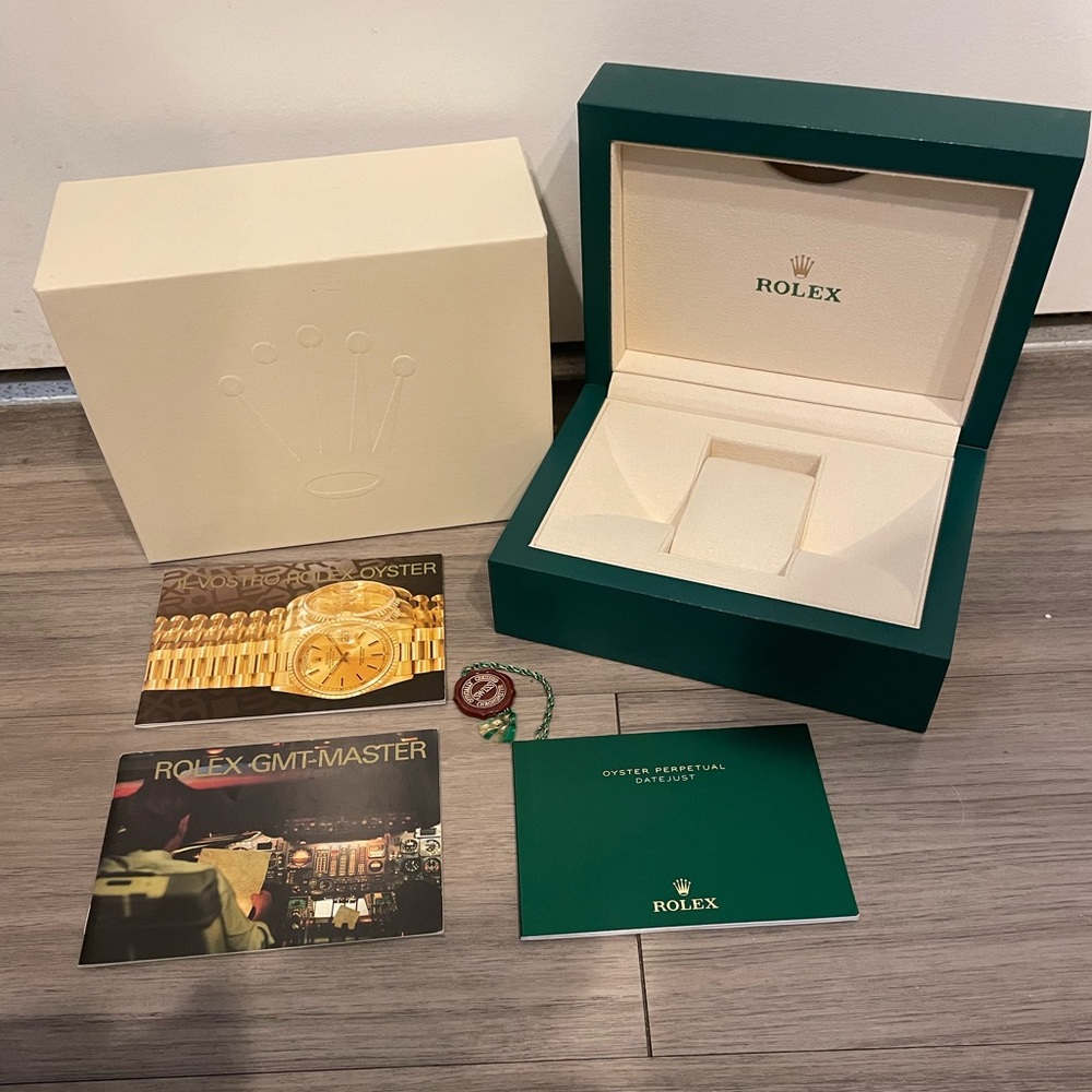 Rolex watch box with books and tag